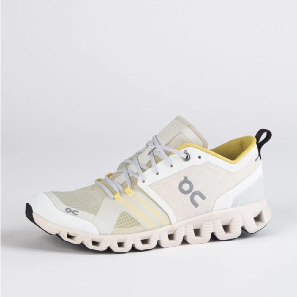On Running Yellow and White Athletic Shoes with CloudTec Sole